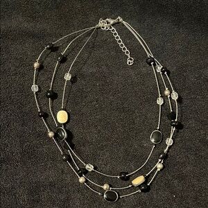 Elegant Multi-Strand Black and Gold Necklace
